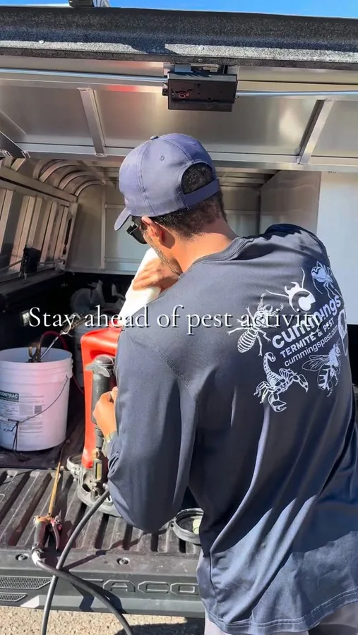Cummings technician preparing treatment equipment at a service vehicle